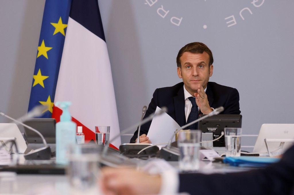 Emmanuel Macron Covid-19 AFP