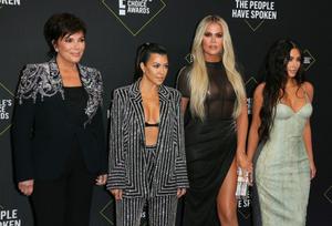 Khloé Kardashian Kim Kardashian AFP