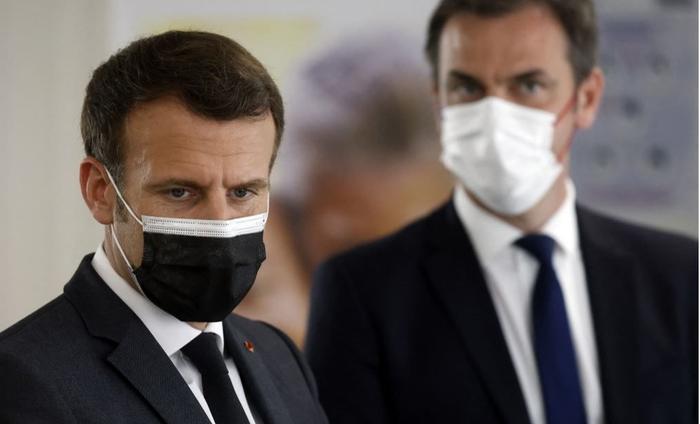 Emmanuel Macron Olivier Véran AFP