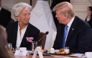 Donald Trump s'entretient avec la directrice générale du Fonds monétaire international, Christine Lagarde, lors du sommet du G7 à La Malbaie, au Québec, au Canada, le 9 juin 2018.