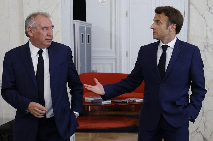 François Bayrou Emmanuel Macron AFP