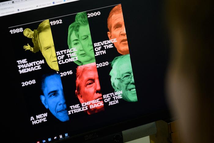 Un journaliste de l'AFP regarde un écran d'ordinateur affichant un mème politique basé sur la série de films Star Wars annonçant Bernie Sanders comme le nouveau président des États-Unis en 2020.