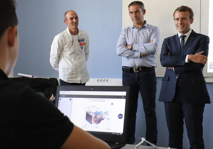 apprentissage Emmanuel Macron AFP