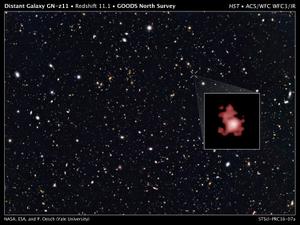 Une brillante galaxie naissante, nommée GN-z11, vue telle qu'elle était il y a 13,4 milliards d'années, soit seulement 400 millions d'années après le Big Bang.