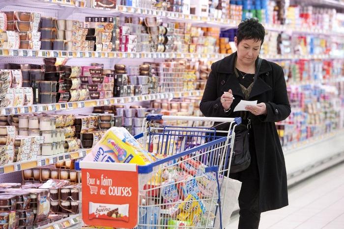 supermarché courses caddie AFP