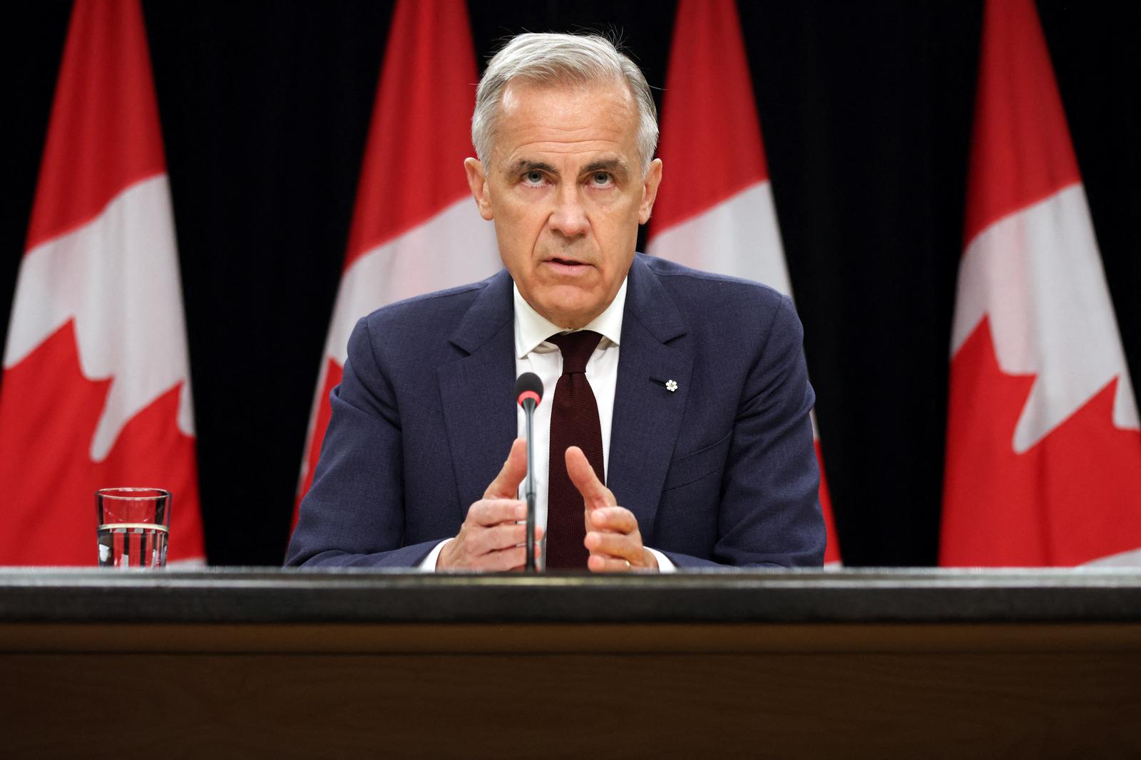 Le Premier ministre canadien Mark Carney s'exprime lors d'une conférence de presse au National Press Theatre à Ottawa, au Canada, le 25 juin 2026.