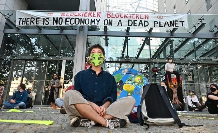 environnement extinction rebellion économie AFP