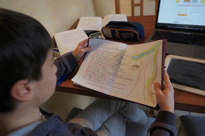 école élève devoirs AFP