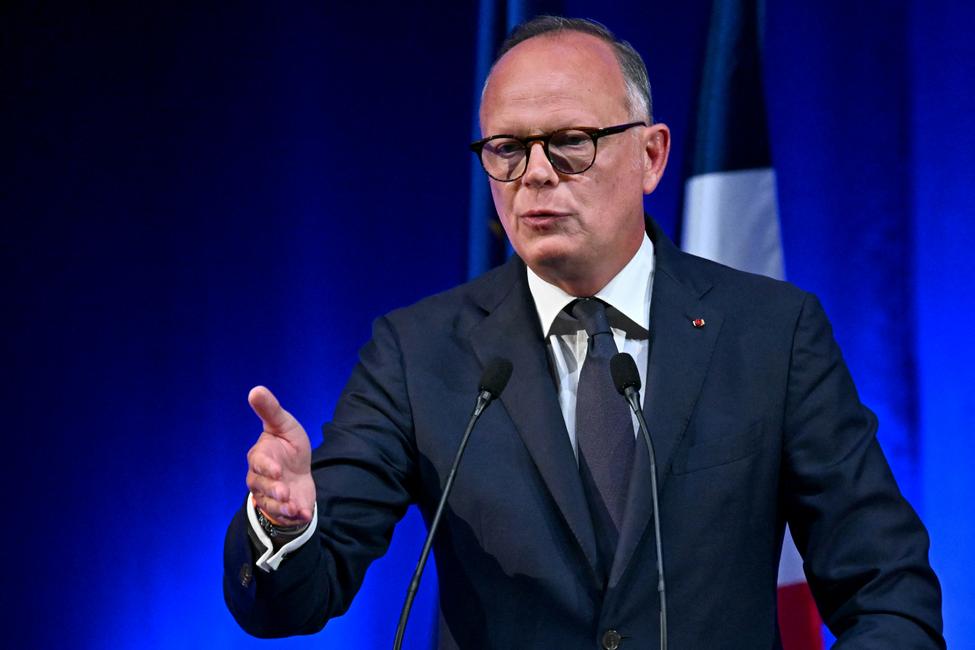 Édouard Philippe, fondateur et président du parti de droite Horizons, maire du Havre et candidat à l'élection présidentielle française de 2027, s'adresse aux hauts responsables du parti lors d'un rassemblement à Reims le 10 mai 2026.