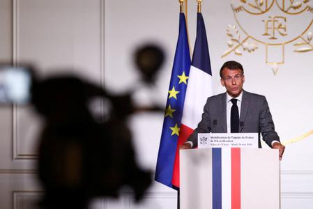 Le président français Emmanuel Macron prononce un discours lors d'une conférence de presse, au palais de l'Élysée à Paris, le 26 mai 2026.