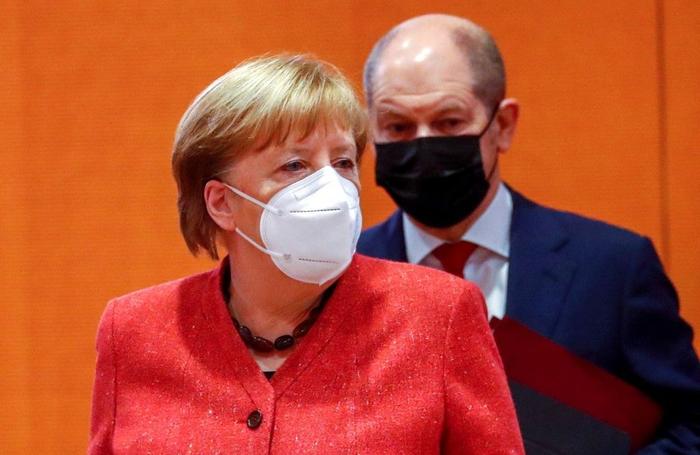 Angela Merkel Olaf Scholz AFP