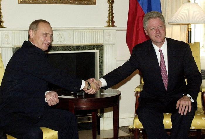 Vladimir Poutine Bill Clinton AFP