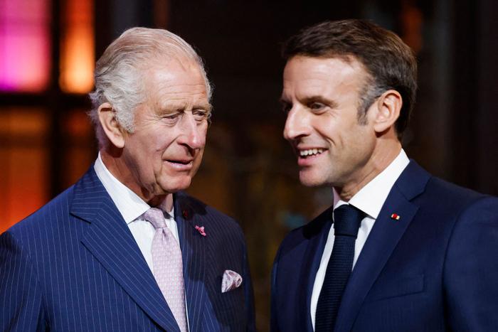 Emmanuel Macron Charles III AFP