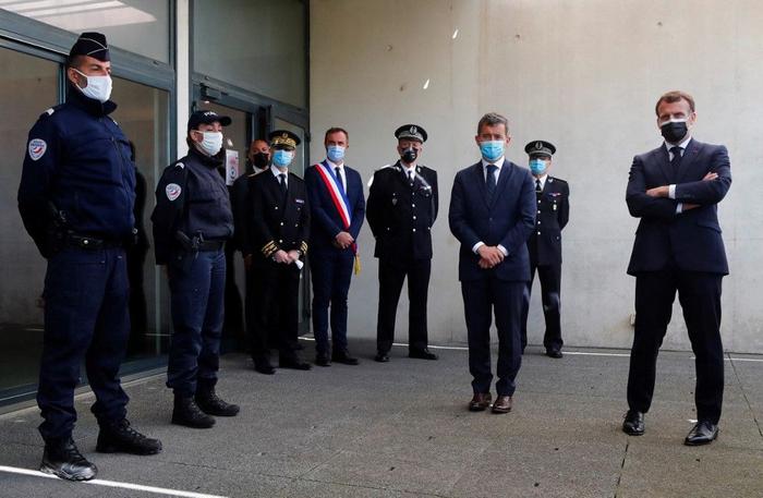 Emmanuel Macron Gérald Darmanin police Montpellier AFP