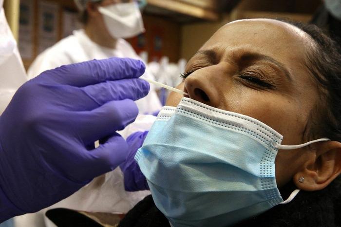 tests Covid-19 pandémie prélèvement nasal AFP