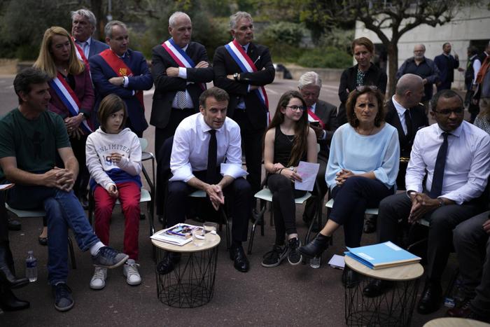 Emmanuel Macron éducation nationale AFP