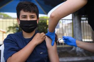 vaccination adolescent Covid-19 AFP