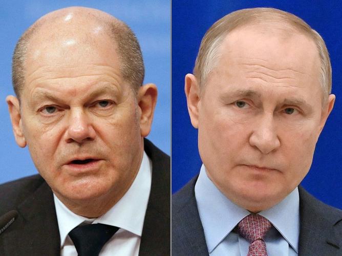 Vladimir Poutine Olaf Scholz AFP
