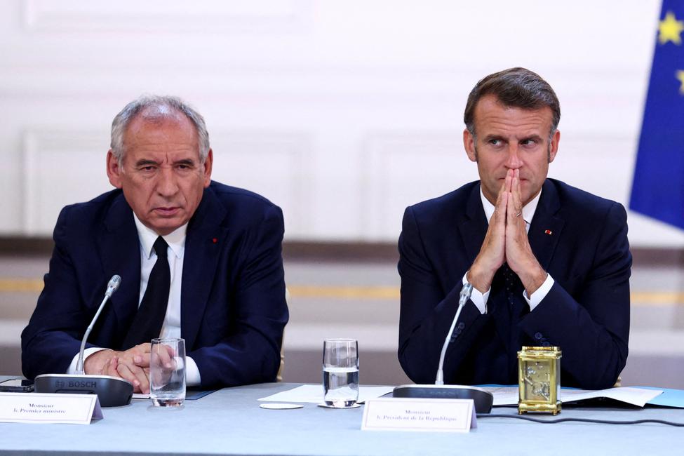 Emmanuel Macron et François Bayrou lors d'une réunion à l'Elysée.