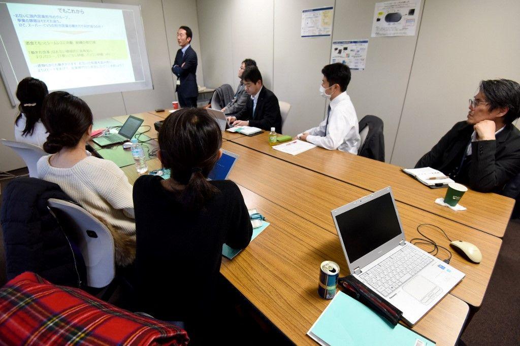 réunion travail entreprise salariés AFP