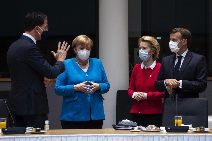 Emmanuel Macron Angela Merkel Ursula von der Leyen AFP n