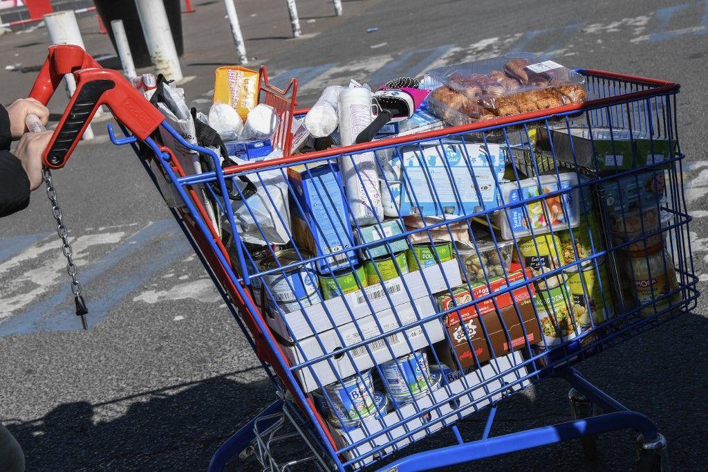 supermarché courses caddie alimentation AFP