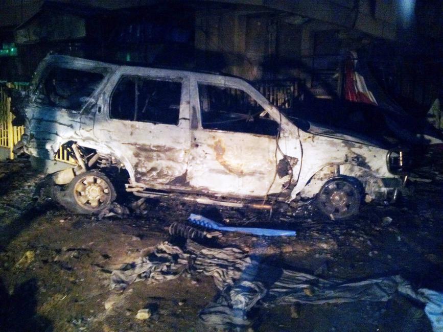 Photo de l’épave d’une voiture prise le 18 mai 2014 sur les lieux d’un attentat-suicide dans le quartier majoritairement chrétien de Sabon Gari, à Kano, dans le nord du Nigeria. Cinq personnes, dont l’auteur de l’attentat, ont été tuées lorsqu’une voiture piégée a explosé près d’un bar en plein air, détruisant six véhicules et soufflant les vitres de plusieurs immeubles. (Image d'illustration)
