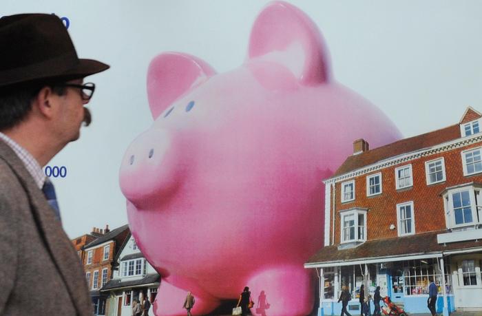 Tirelire symbole de l'épargne ou de l'assurance-vie. (Image d'illustration)