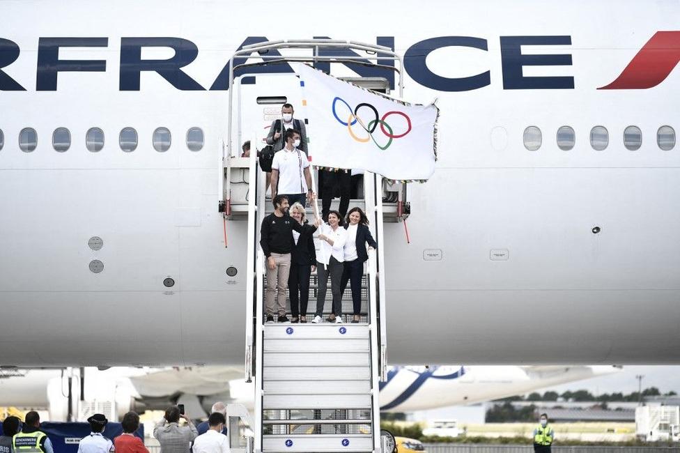 jeux olympiques drapeau Paris 2024 AFP