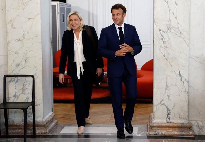 Emmanuel Macron Marine Le Pen AFP