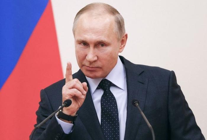 Vladimir Poutine lors d'une conférence de presse.