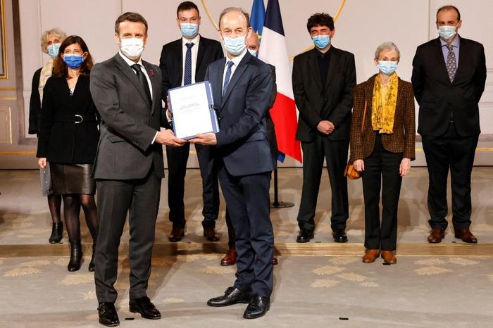 Emmanuel Macron rapport Rwanda AFP