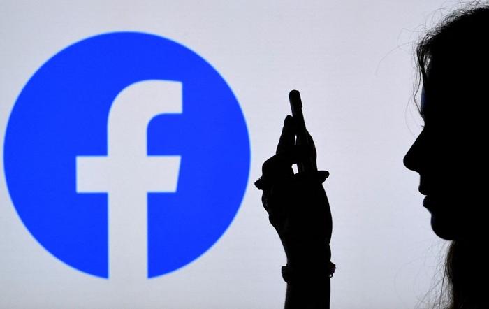 Facebook logo smartphone AFP