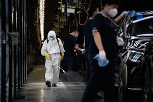 Chine usine Covid-19 AFP