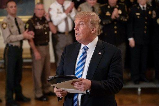 NICHOLAS KAMM / AFP